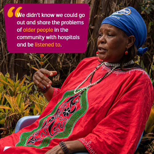 Older woman in a red tunic and blue headscarf. Text: "We didn't know we could go out and share the problems of older people in the community with hospitals and be listened to. "